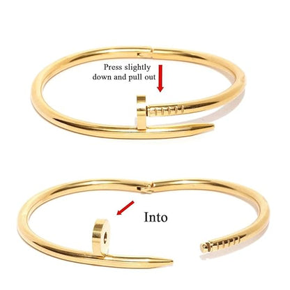 Gold bangle with instructions on how to open it