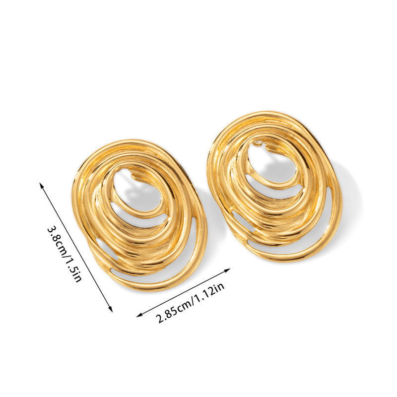 Gold spiral earrings with measurements on a white background
